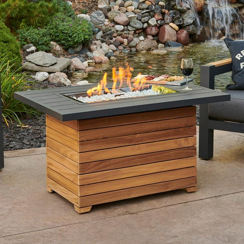 Darien 42 Inch Rectangular Teak Propane Fire Pit Table in Gray By The Outdoor GreatRoom Company